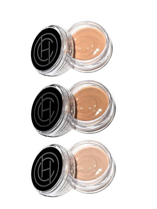 Three small jars of Chantal Hart BB cream, each with a different shade, arranged vertically.
