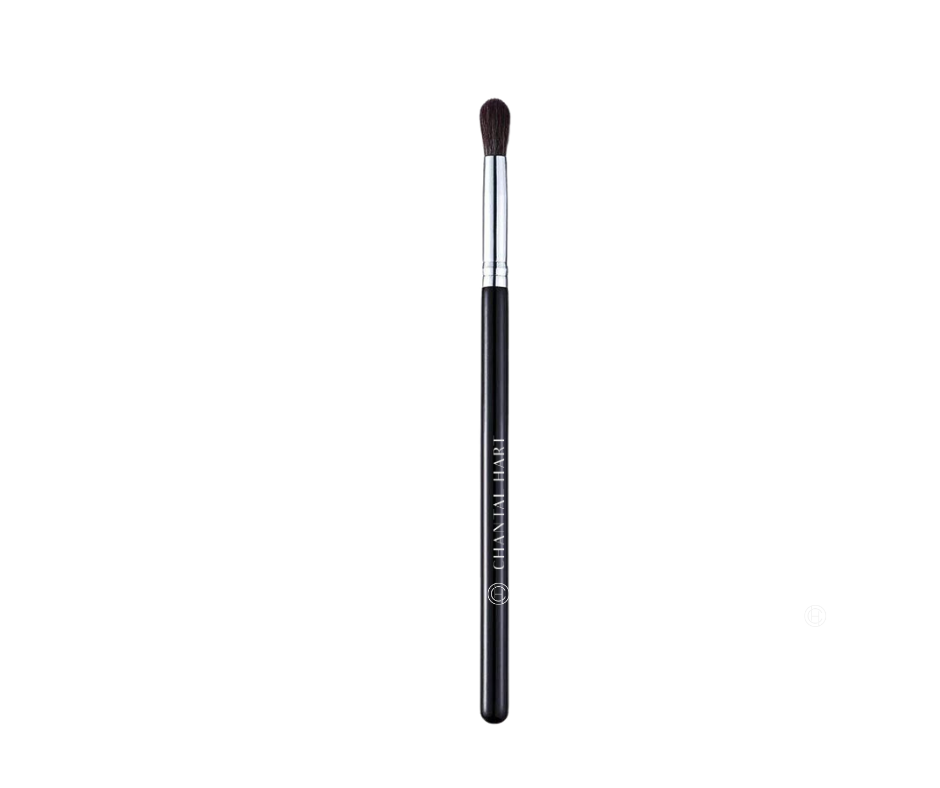 A single Chantal Hart eyeshadow brush with a round brush head and a black handle.