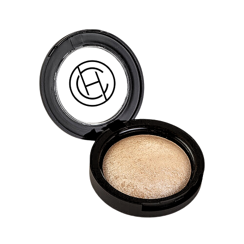 A baked mineral highlighter with a white and gold appearance, in a black pan.
