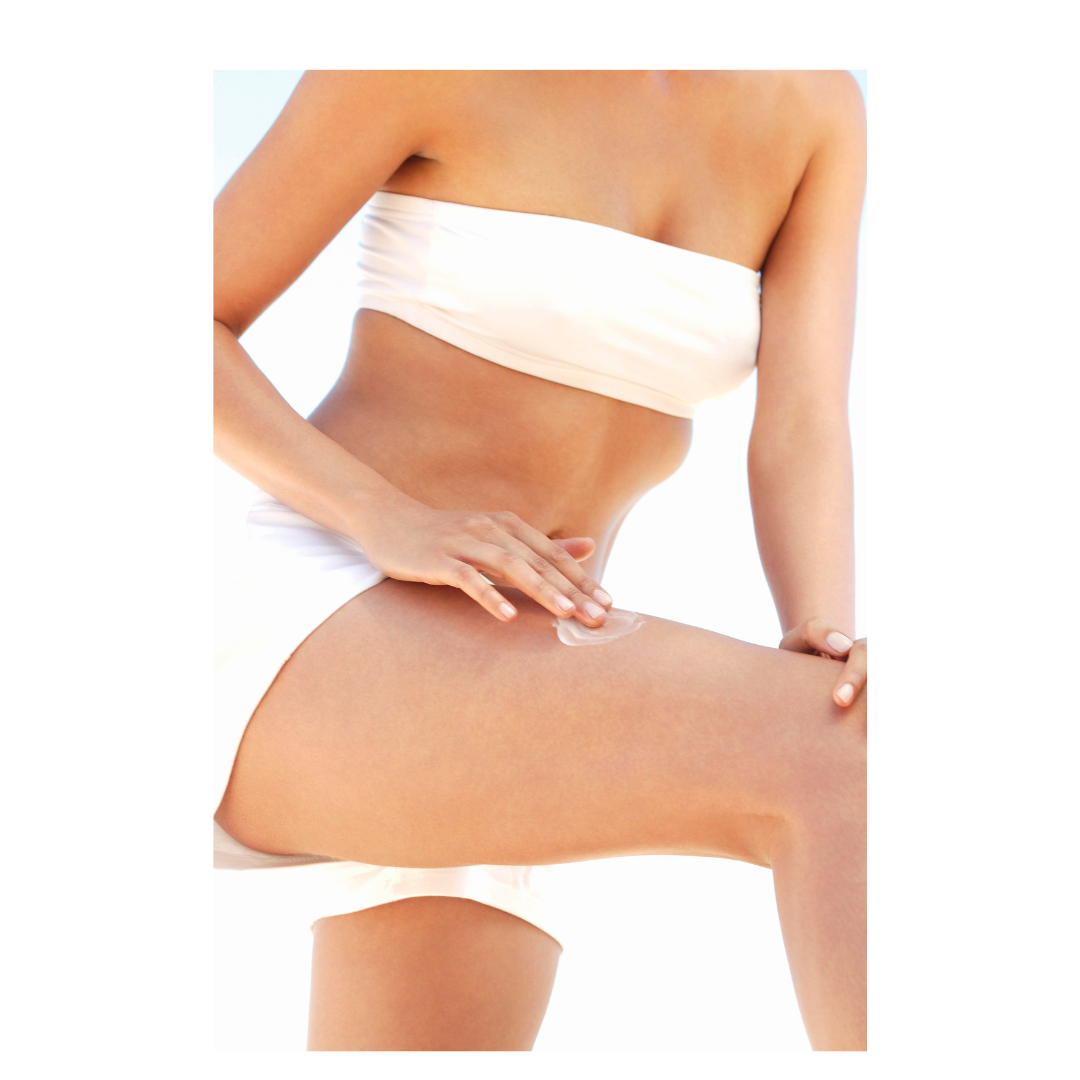 A woman with olive skin using Chantal Hart gradual tan on her legs