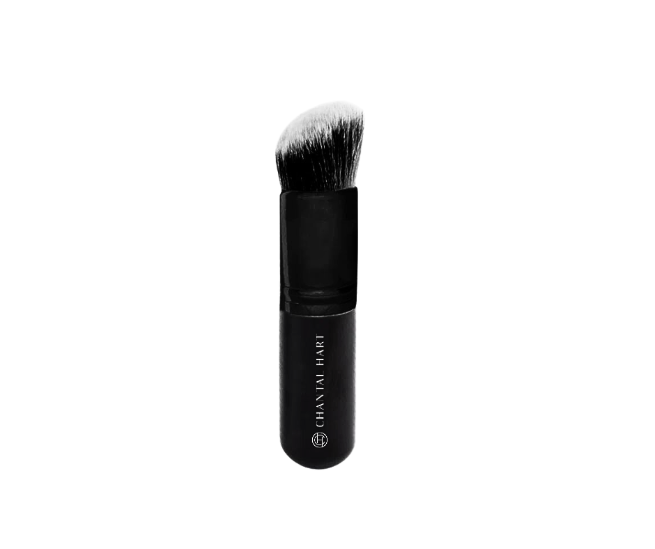 A black Chantal Hart foundation brush with angled synthetic bristles for makeup application.