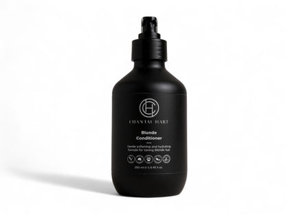 Black conditioner bottle with brand logo on a white background