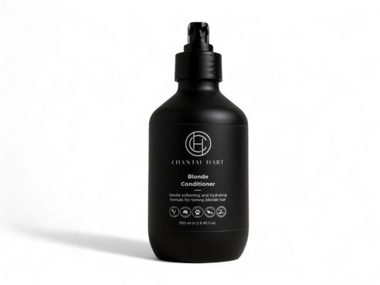 Black conditioner bottle with brand logo on a white background