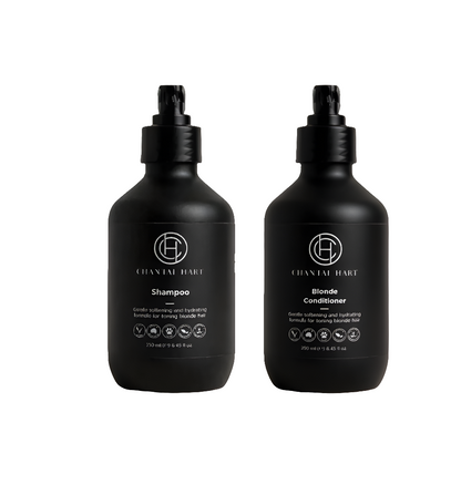 Two black bottles of Chantal Hart shampoo and conditioner on a white background
