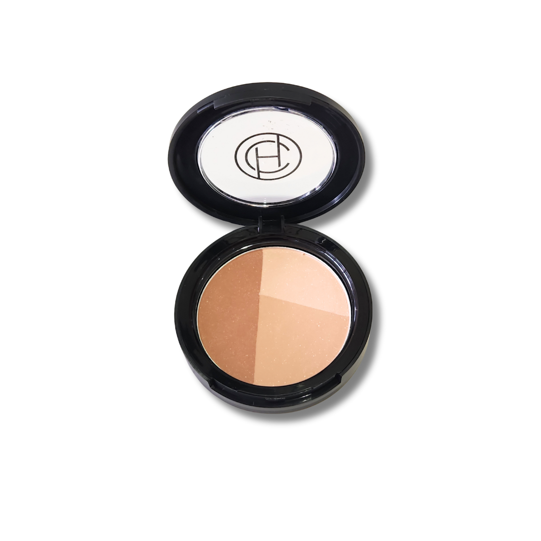 A compact mineral bronzer by Chantal Hart, open with the product visible inside the compact case.